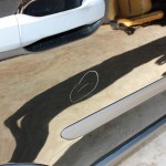 This deeper scratch appears to be caused by a key and will require some wet sanding or color sanding before being polished away